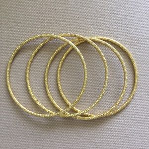 NWOT Set of 4 gold bangles